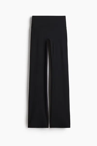 H&m Flared Yoga Leggings With Softmove Lycra In Transparent