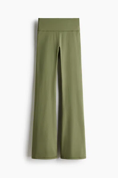 H&m Flared Yoga Leggings With Softmove In Green