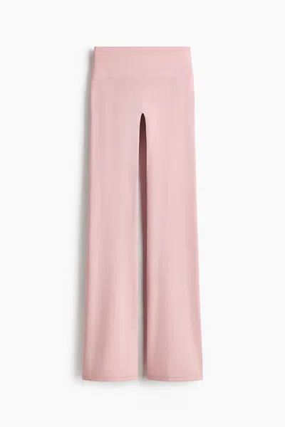 H&m Flared Yoga Leggings With Softmove In Pink