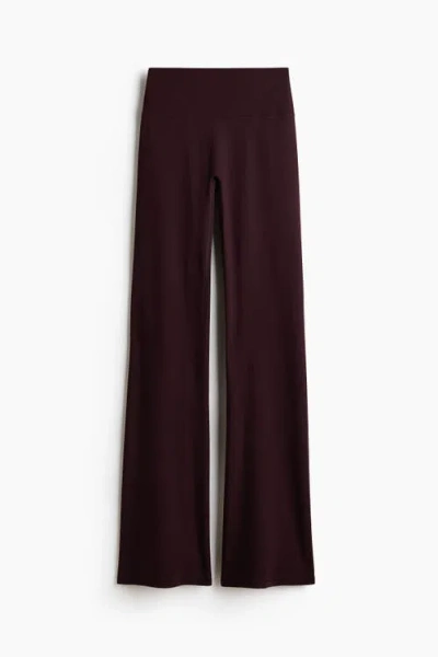 H&m Flared Yoga Leggings With Softmove In Purple