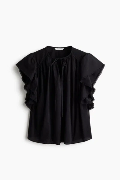H&m Flutter-sleeved Lace-trimmed Blouse In Black