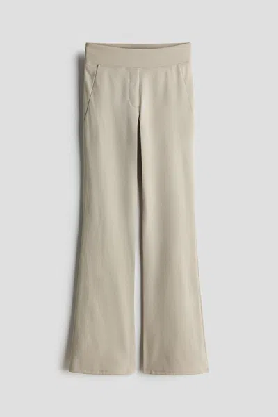 H&m Four-way Stretch Flared Pants In Neutral