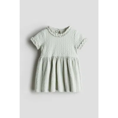 H&m Babies'  Frill-trimmed Jacquard-jersey Dress In Brown