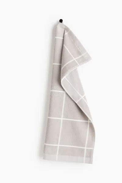 H&m Grid-patterned Hand Towel In Gray