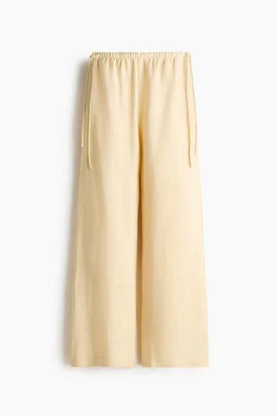 H&m Linen-blend Drawstring Trousers In Yellow