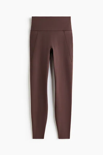 H&m Pocket-detail Sports Leggings With Softmove In Brown