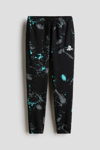 H&m Kids'  Printed Brushed-inside Joggers In Black