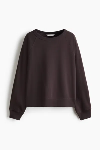 H&m Raglan-sleeved Sweatshirt In Black