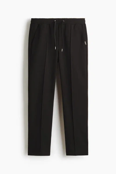 H&m Regular Fit Tailored Joggers In Black