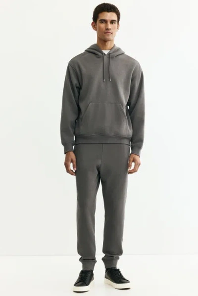 H&m Regular-fit Tapered Sweatpants In Green
