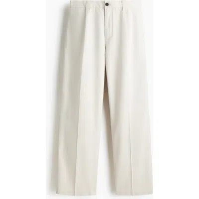 H&m Relaxed Fit Cotton And Lyocell Tailored Trousers In Neutral