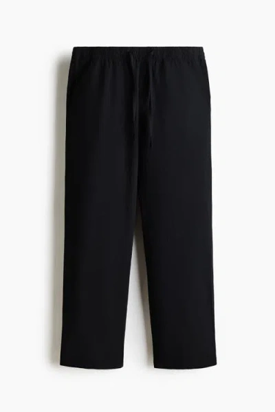 H&m Relaxed Fit Poplin Trousers In Black