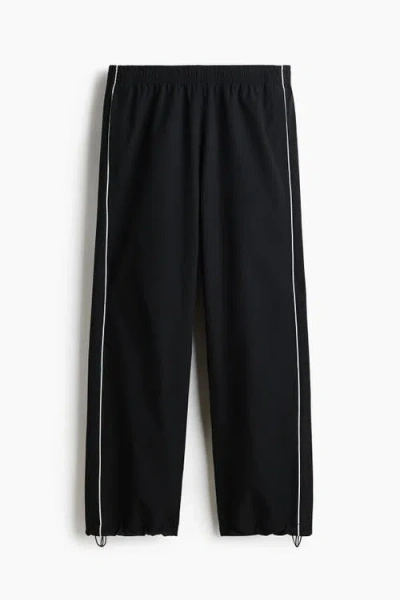 H&m Relaxed Fit Printed Track Pants In Black
