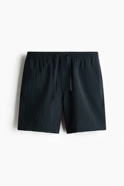H&m Relaxed Fit Textured Shorts In Green