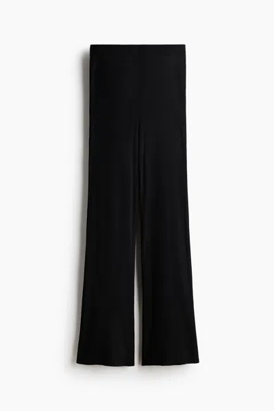 H&m Four-way Stretch Flared Pants In Black