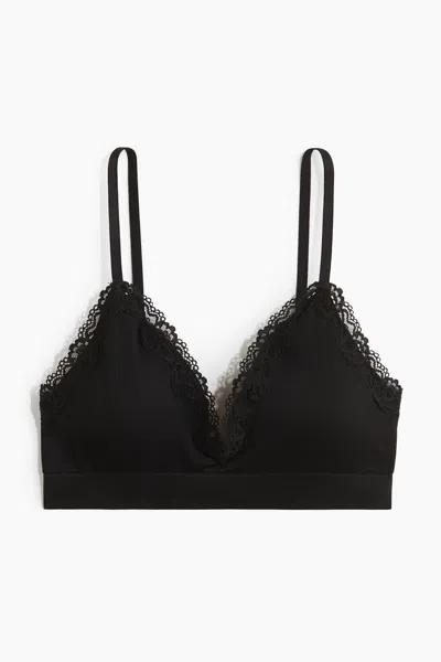 H&m Seamless Padded Soft-cup Bra In Black