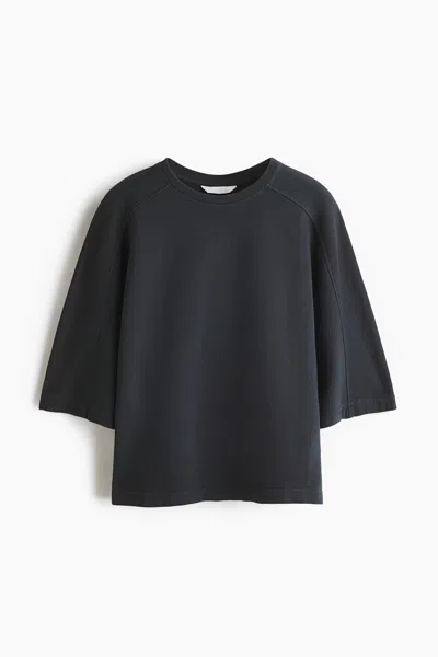 H&m Short-sleeved Cotton Sweatshirt In Black