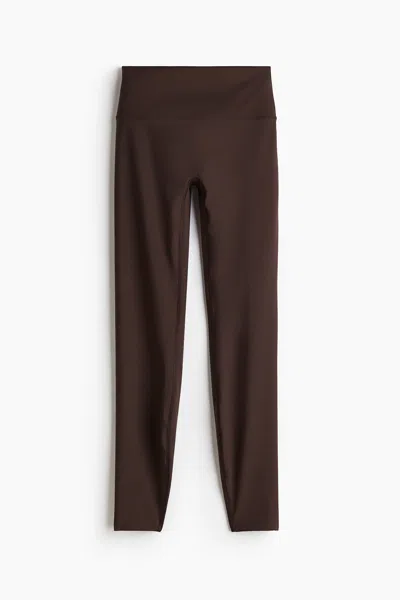 H&m Sports Leggings With Cool Handfeel Drymove In Warm Brown