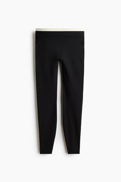 H&m Sports Leggings With Softmove In Black