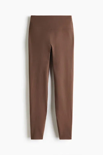 H&m Sports Leggings With Softmove In Brown