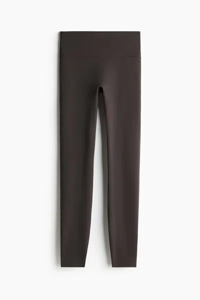 H&m Sports Leggings With Softmove In Brown
