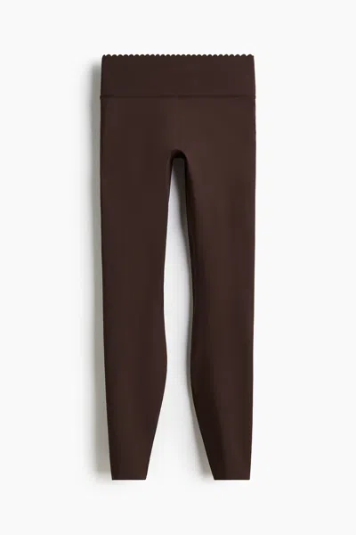 H&m Sports Leggings With Softmove In Brown
