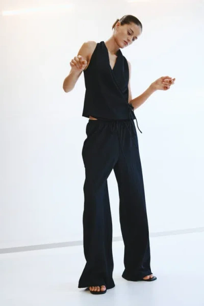 H&m Textured Drawstring Trousers In Black