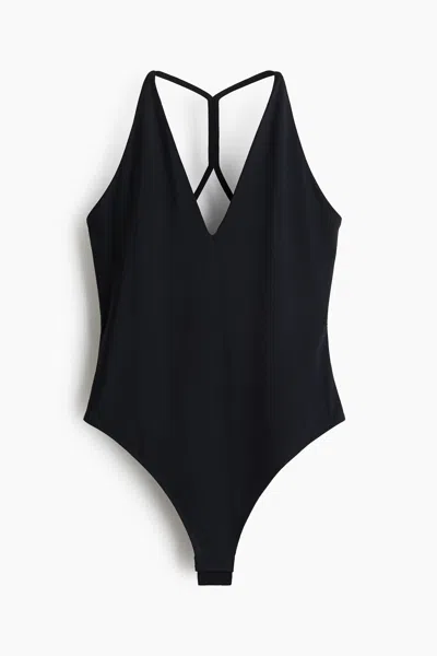 H&m V-neck Thong Bodysuit In Animal Print