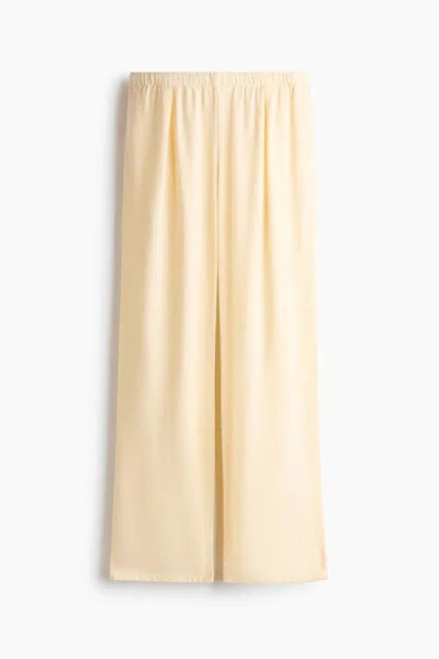 H&m Wide Linen-blend Trousers In Yellow