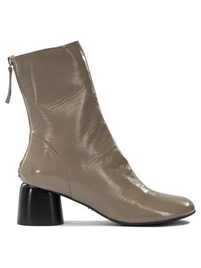Halmanera Leather Zippered Ankle Boots In Sand