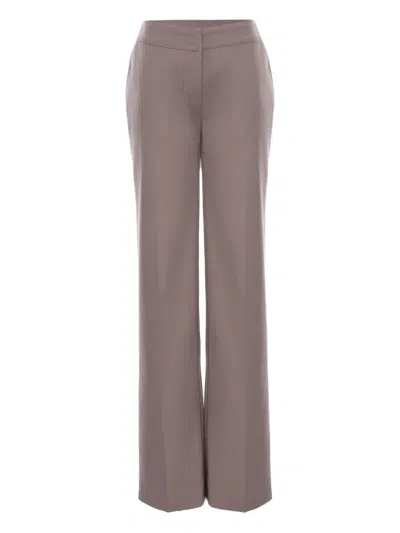 Hamza Swan Trousers In Brown
