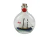 Handcrafted Cast Iron Bluenose Sailboat In A Glass Bottle 4"