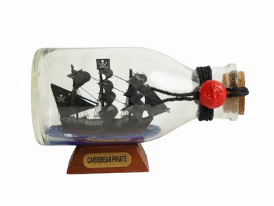 Handcrafted Cast Iron Caribbean Pirate Model Ship In A Glass Bottle 5"
