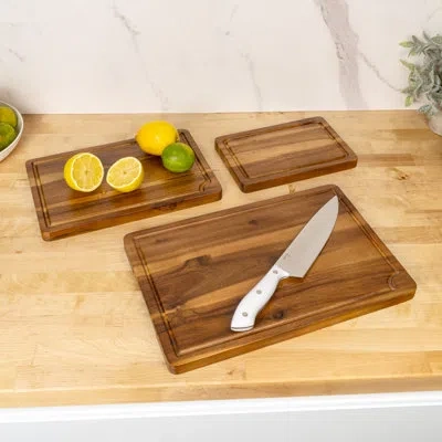 Happimess Hespera Handcrafted Acacia Wood Grain Reversible Cutting Board With Juice Grooves And Built-in Handl In Brown