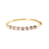 Haus Of Brilliance 14k Yellow Gold Alternating Bezel Set 5mm Oval Shaped Tanzanite And 1/5 Cttw Diamond Bangle Bracelet In Yellow