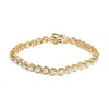 Haus Of Brilliance .925 Sterling Silver 1/10 Cttw Diamond Open Circle Beaded Wheel Link Tennis Bracelet In Yellow