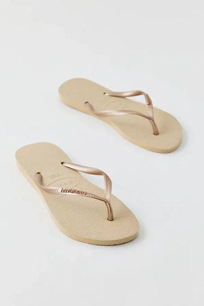 Havaianas Slim Flip Flops Sandal In Sand Grey, Women's At Urban Outfitters In Brown