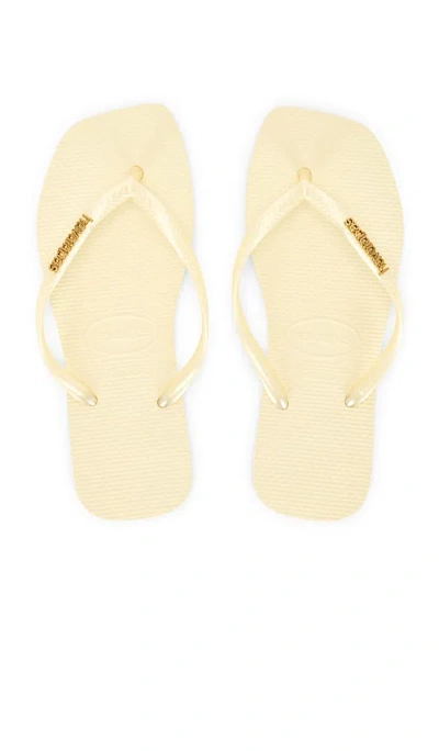 Havaianas Slim Square Logo Metallic Sandal In Yellow