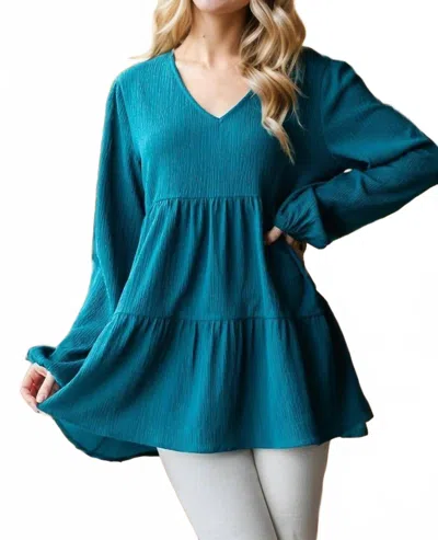 Heimish Usa Long Sleeve Tiered Top In Teal In Blue