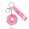 Hello Kitty Donut Keychain With Pink Strap And Sprinkles In Pink
