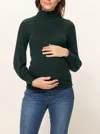Hello Miz Curly Hem Mock Neck Ribbed Sweater Knit Maternity Top In Dark Green In Multi