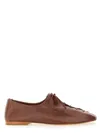 Hereu Elegant Lambskin Moccasin Slip-ons For Women In Brown