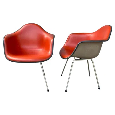 Pre-owned Herman Miller Pair Of Charles And Ray Eames Padded Arm Shell Chairs, Two-tone / In Orange