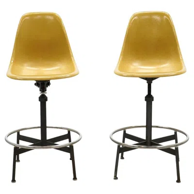 Pre-owned Herman Miller Pair Of Yellow, Swivel Barstools / Drafting Stools By Charles And Ray Eames In Brown