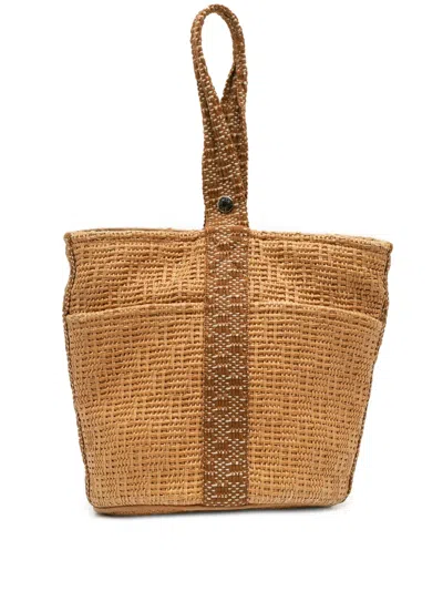Pre-owned Hermes 1990-2010 Woven Straw Saxo Mm Bucket Bag In Brown