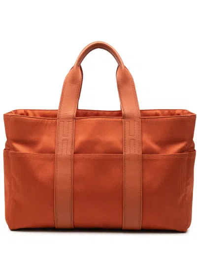 Pre-owned Hermes 1990-2010 Toile Acapulco Mm Tote Bag In Orange