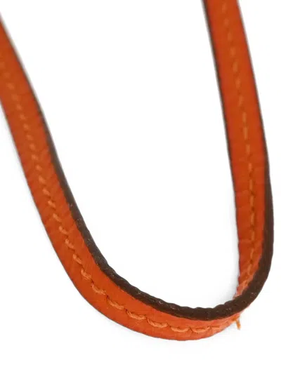 Pre-owned Hermes 2000 Clochette Leather Necklace In Orange