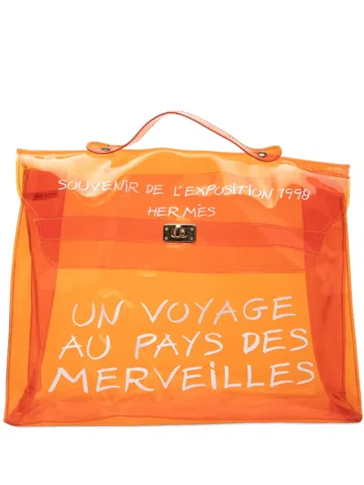 Pre-owned Hermes 2000-2010 Vinyl Souvenir De L Exposition Kelly Handbag In Orange
