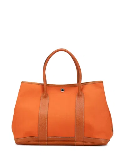Pre-owned Hermes 2006 Toile And Negonda Garden Party 30 Satchel In Orange