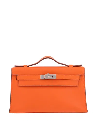 Pre-owned Hermes 2009 Kelly Clutch Bag In Orange